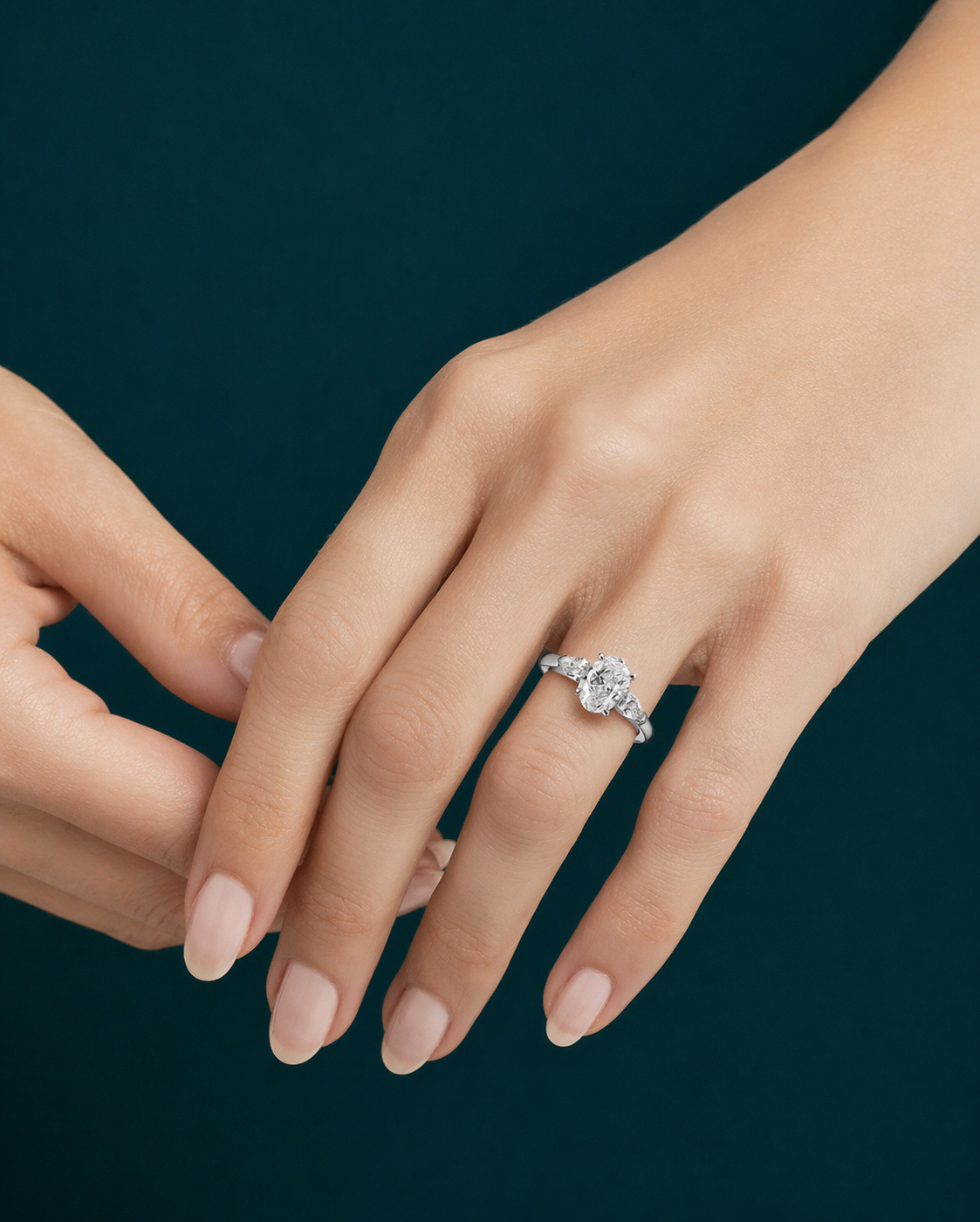 Oval Three-Stone Diamond Ring