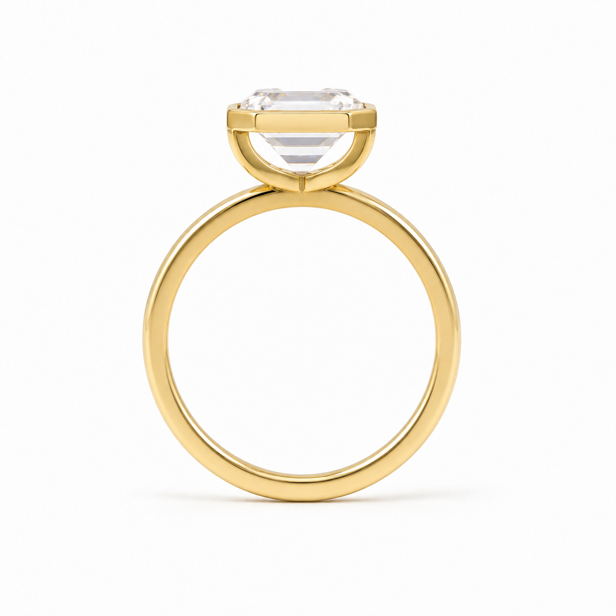4 CT Emerald Cut Lab Diamond Bezel Ring in 18K Yellow Gold – E Color VVS2 IGI Certified